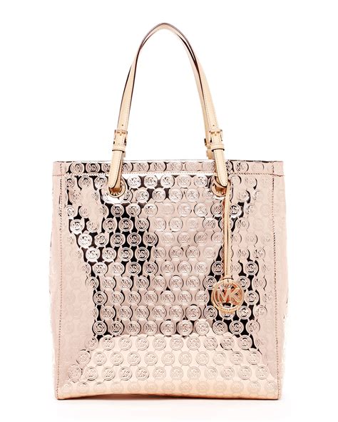 michael kors tote rose gold|Michael Kors gold clutch bag.